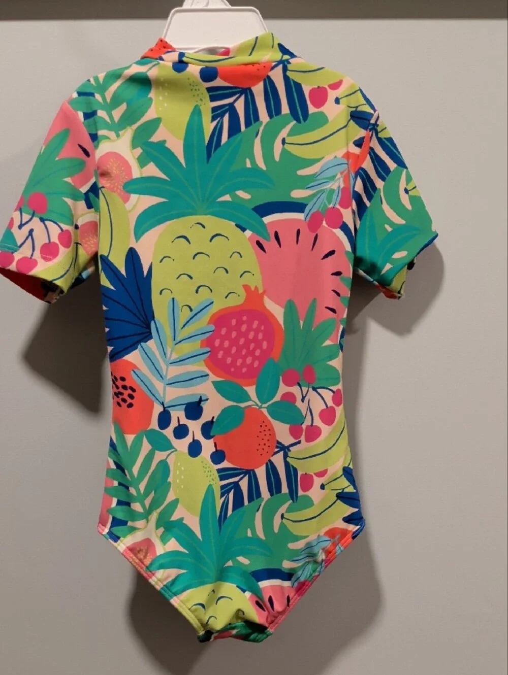 Mini Boden Short-Sleeve Rashguard Swimsuit in Pink, Green, Blue